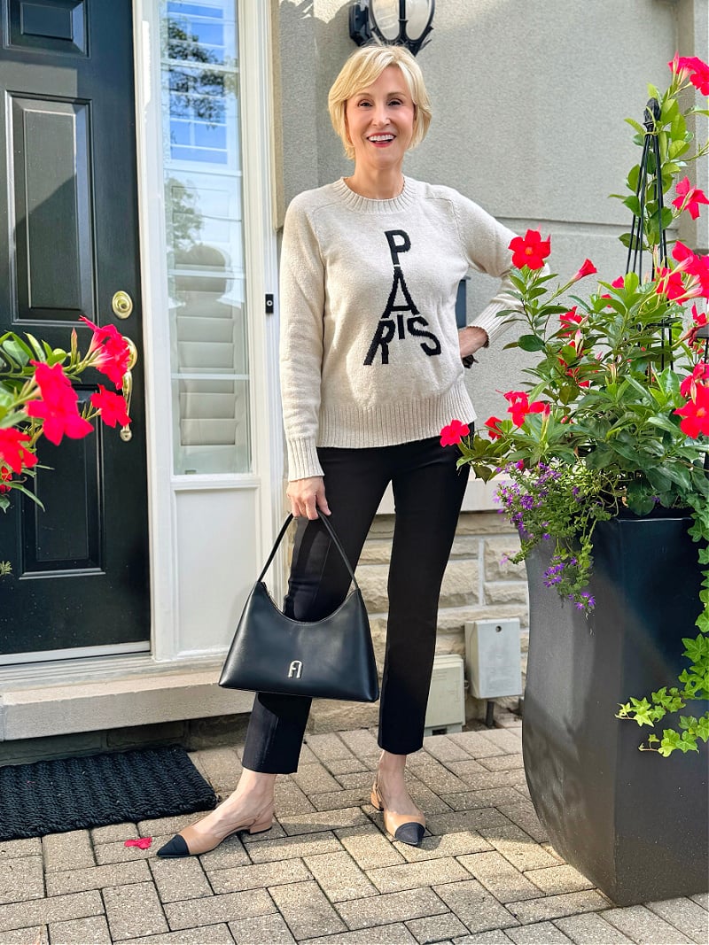 black bag with paris top How To Choose the Right Handbag for Your Body Type