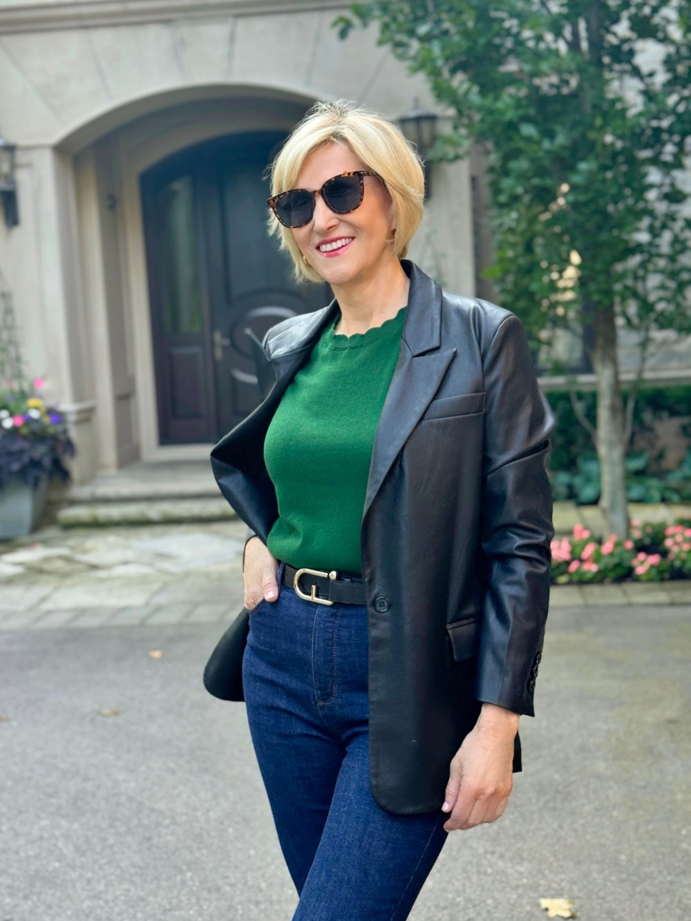 black leather blazer, green sweater