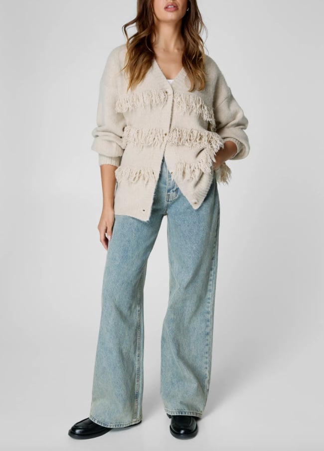 boho outfit fringe sweater and vintage jeans