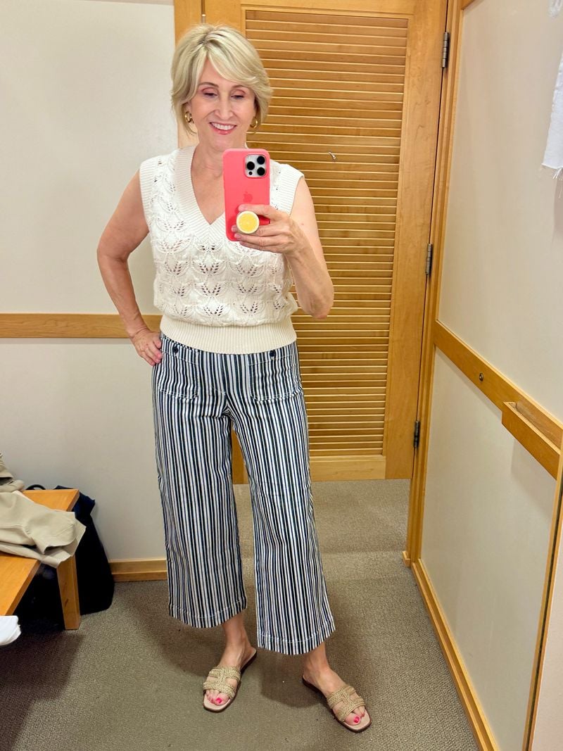 knit vest, black striped pants