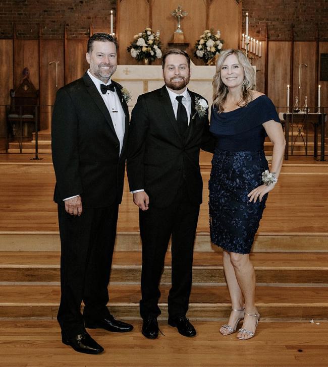 Lisa-Oshea Mother of the bride wearing sparkly navy dress