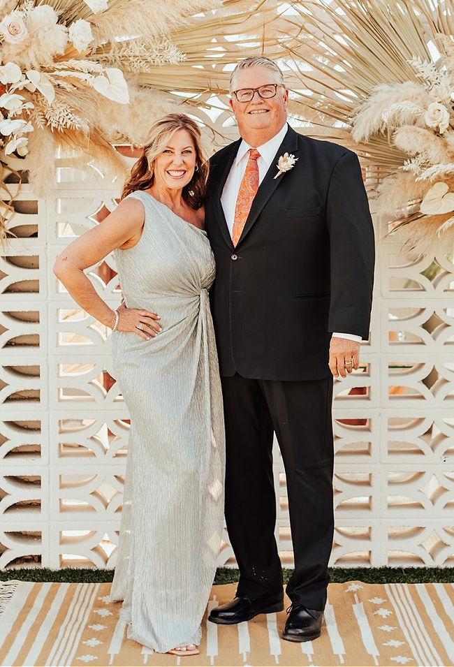 Sandra-Hansen wearing silver Mother of the Bride Dress