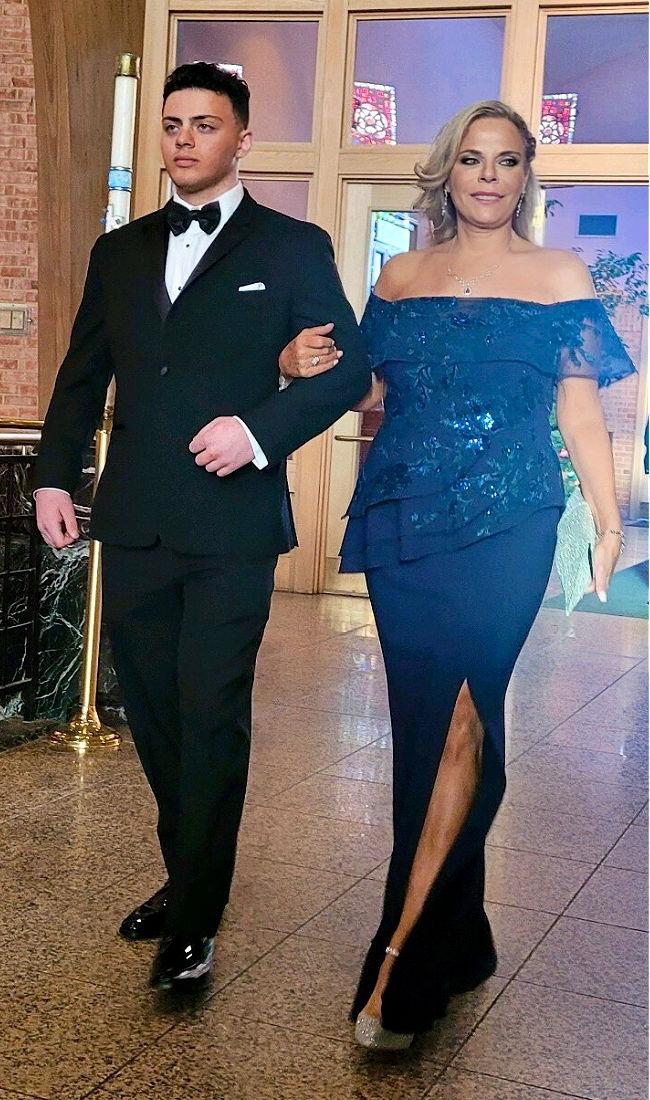 Sandy wearing blue off the shoulder sequin Mother of the Bride Dress